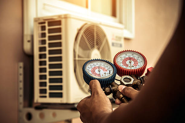 Professional Air Conditioning Service technician working in Crestwood, KY